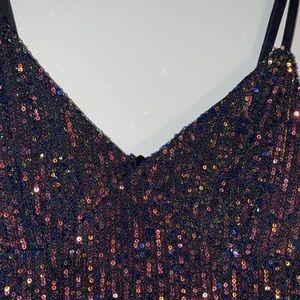 Small rainbow sequin dress.